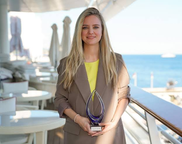 Nicola Beck holding an architecture award